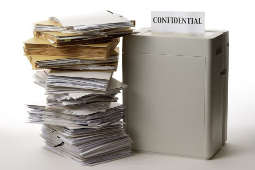 a stack of confidential documents