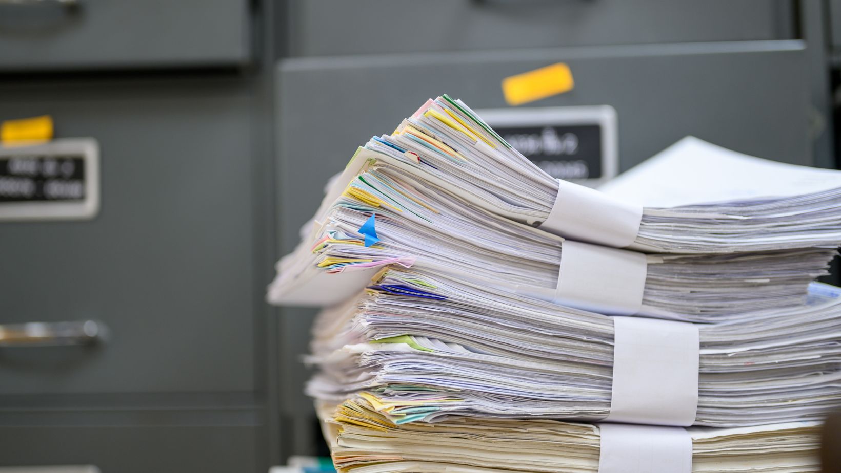 Stack of documents ready for shredding